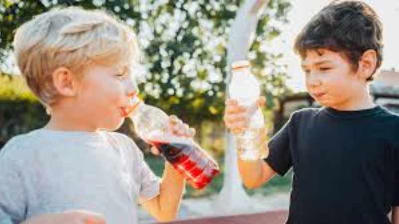 child drinking Cool Drink Telugu Updates: